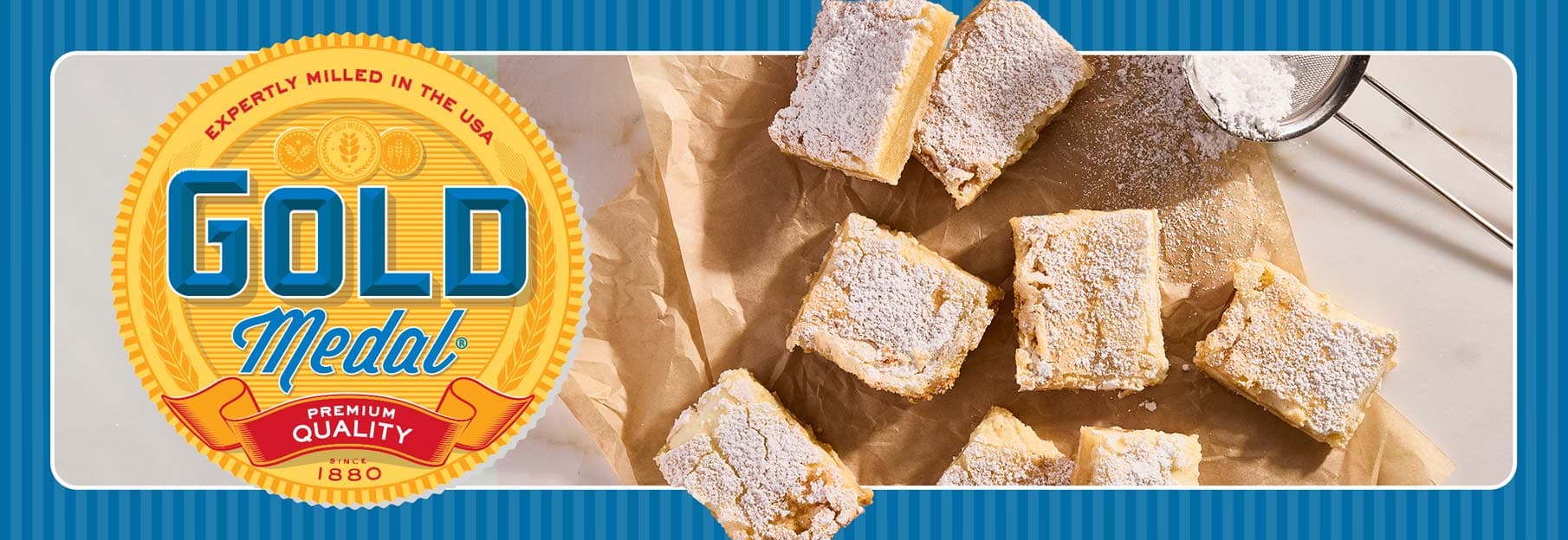 Image with gold medal emblem on the left, with several lemon bars laid out on parchment paper and flour sprinkled on top. There is a blue border over the entire photo.&nbsp;