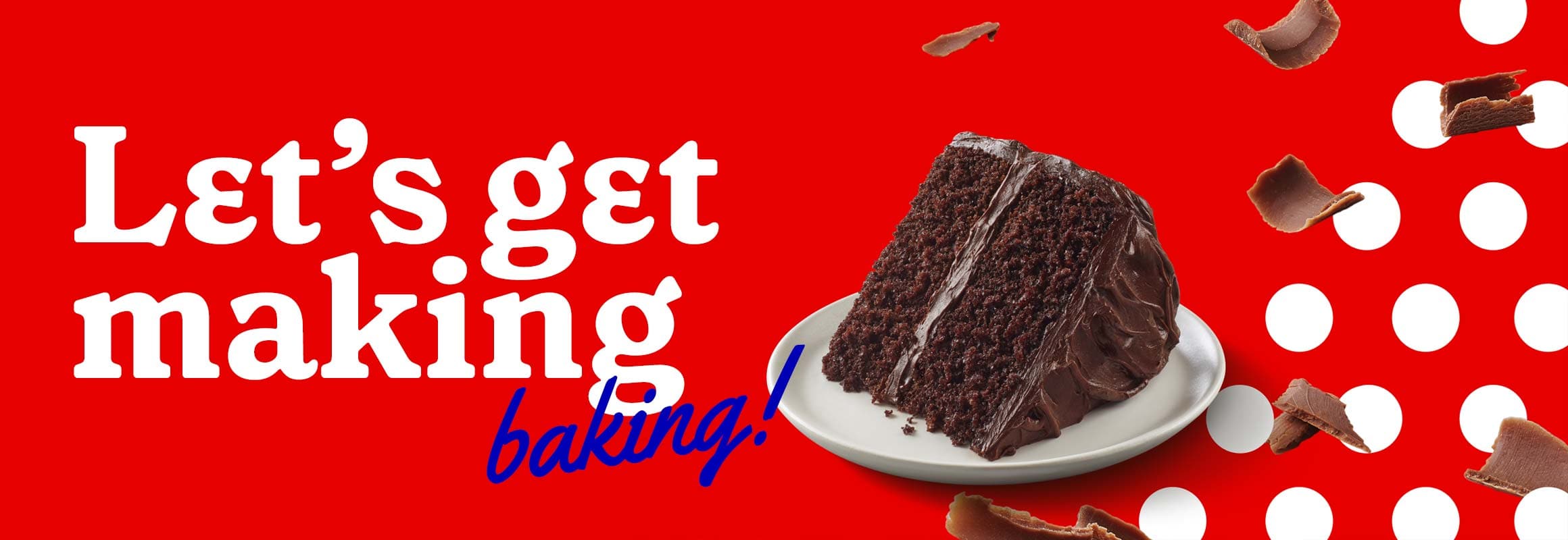Let's get making baking - sliced of chocolate cake with chocolate frosting on a white plate